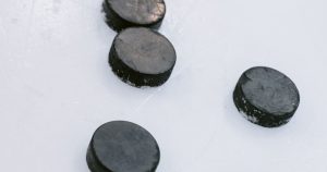 Watch the NHL in Canada - hockey pucks on the ice - StreamQ